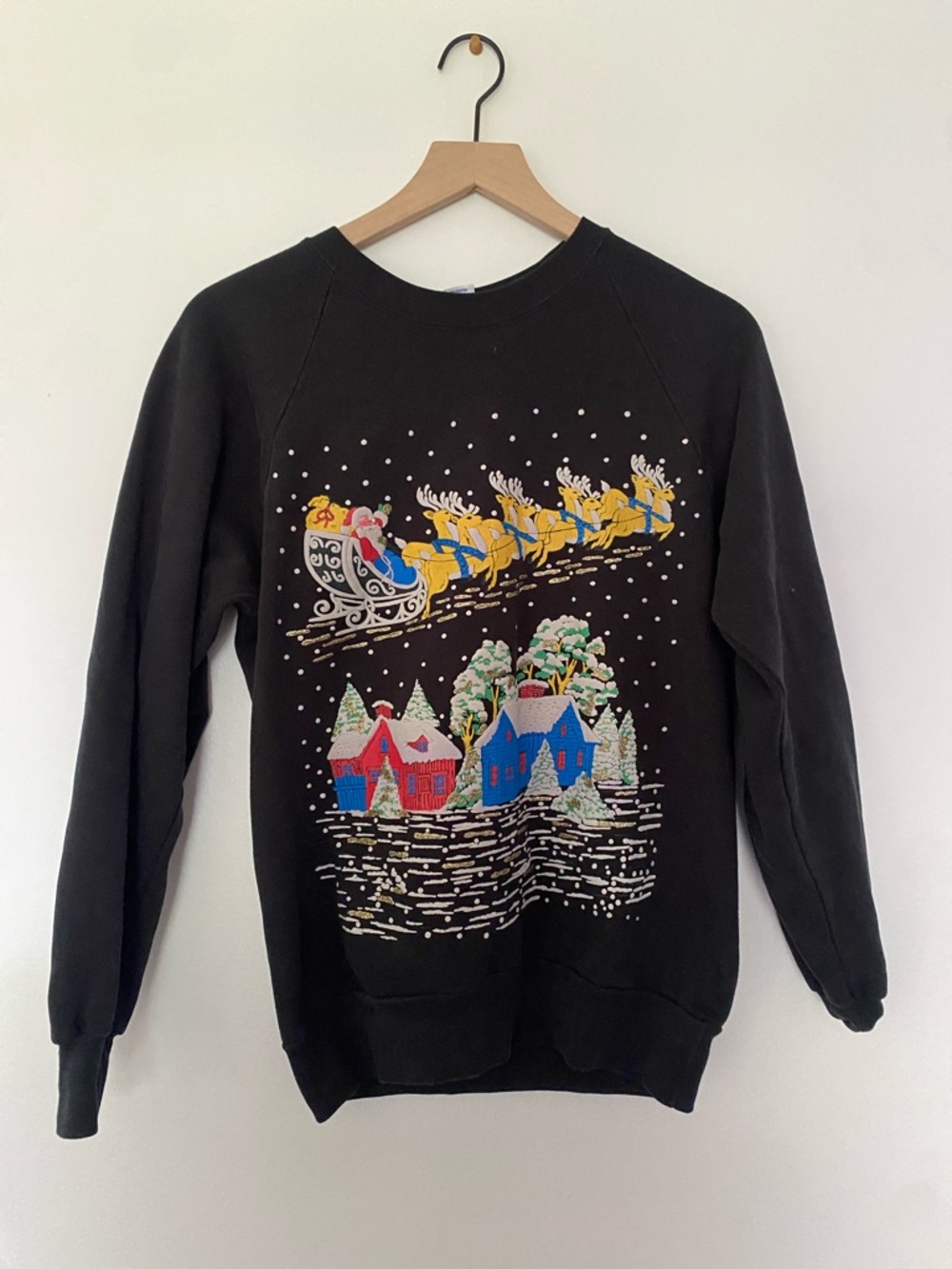 Unisex Black Crewneck Sweater with Santa Sleigh and Snowy Village